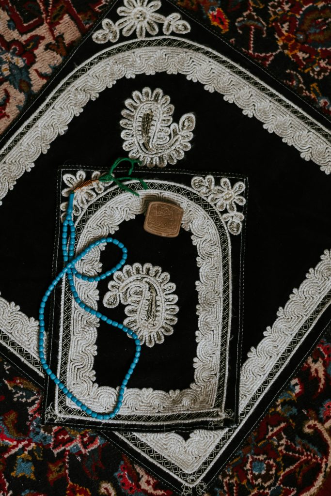 Quran placed on a prayer mat, learn via Online Noorani Qaida Course