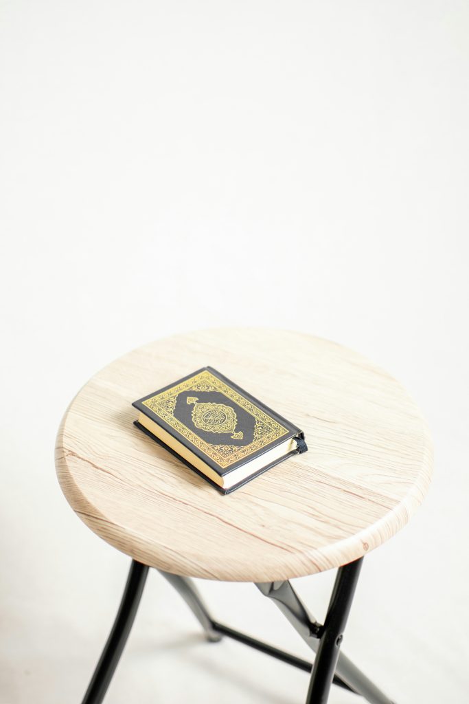 Quran placed on a table, learn through our Online Noorani Qaida Course